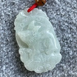 Handcarved jadeite pendant